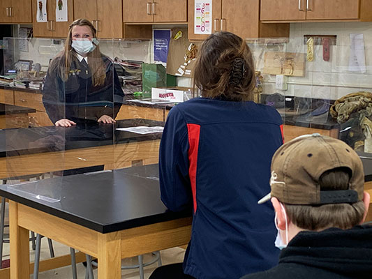 Kayleigh talks to HS students in classroom