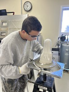 BKW senior Arlan Wright building the mold for a customer's prosthetic.