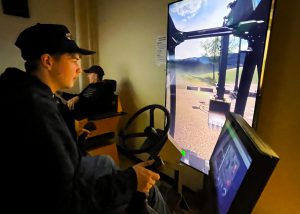 BKW senior Garrett Hempstead uses a heavy equipment simulator recently at the Career and Technical Education Center - Schoharie Campus. 